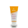 Embalagem e bisnaga de Creme Dental de Calêndula Weleda, pasta de dentes natural sem flúor nem menta.