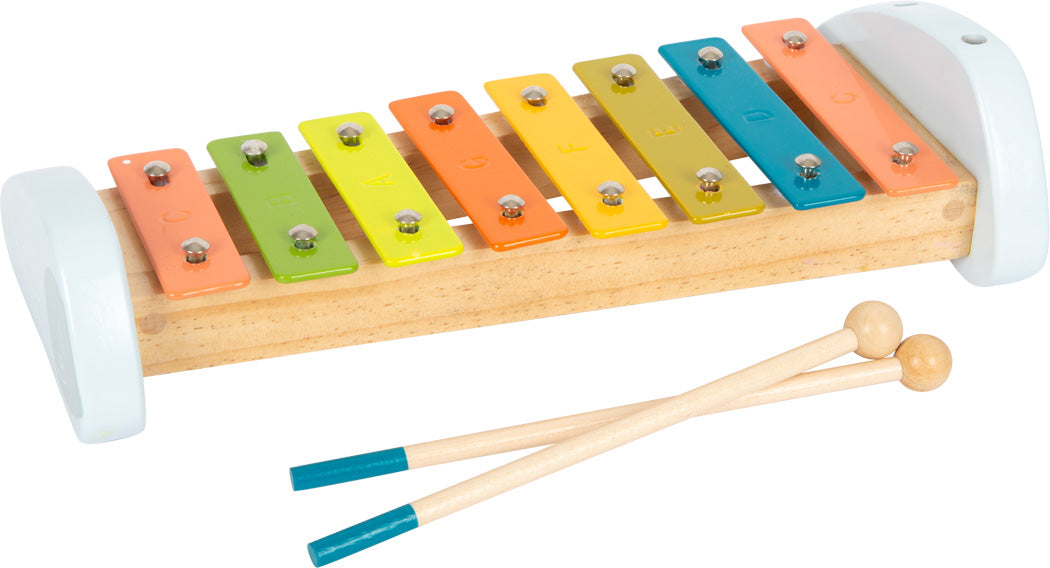 Caixa do xilofone Groovy Beats da small foot, mostrando o instrumento, os malhetes e a partitura; ideal para crianças a partir dos 18 meses.