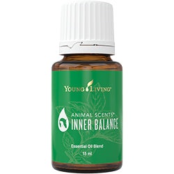 Frasco de óleo essencial Animal Scents Inner Balance da Young Living sobre fundo neutro.