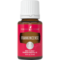 Frasco de 5ml de óleo essencial Frankincense da Young Living sobre uma base de madeira rústica.